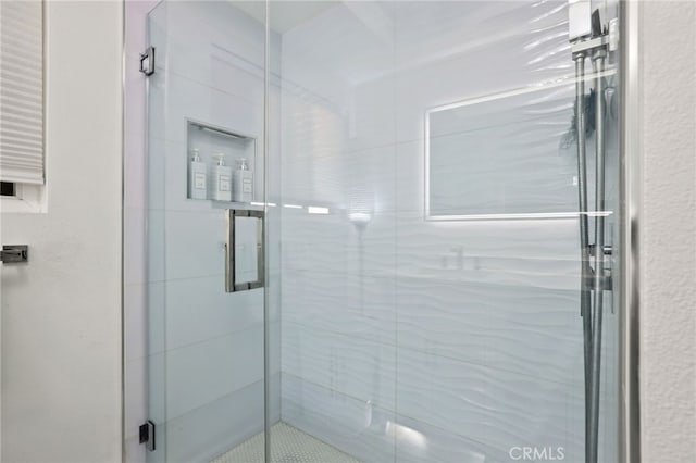 full bathroom with a shower stall