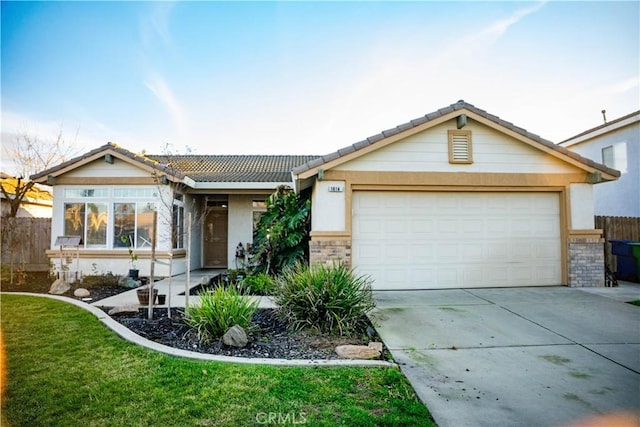 ranch-style home with brick siding, driveway, a tiled roof, and an attached garage