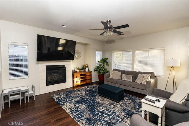 living room with visible vents, ceiling fan, wood finished floors, a fireplace, and recessed lighting