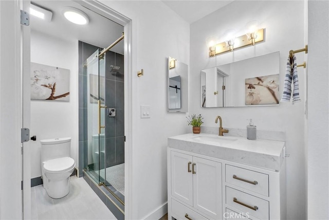 14142 Via Posada Unit 29, Tustin, CA 92780 - full bath featuring toilet, a shower stall, baseboards, and vanity