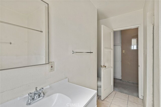 847 W 25th St, San Bernardino, CA 92405 - bathroom featuring tile patterned flooring, vanity, and toilet