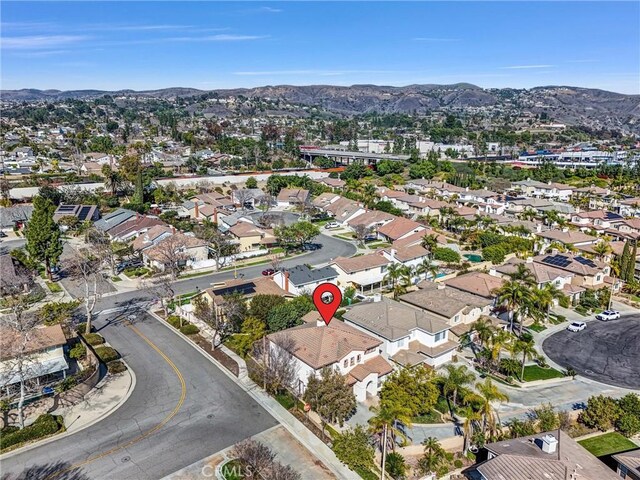 bird's eye view featuring a residential view and a mountain view