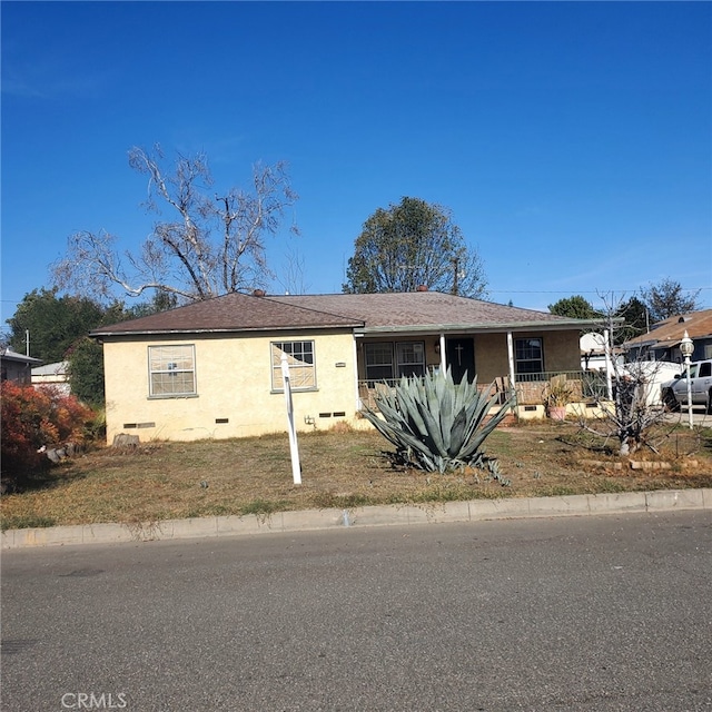 single story home featuring stucco siding