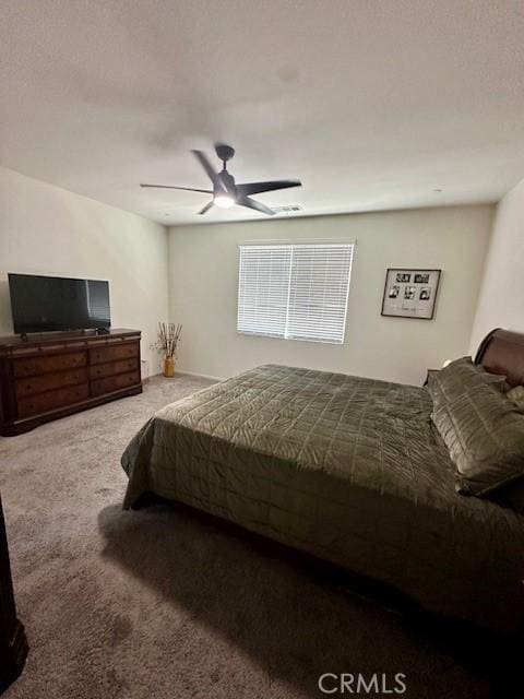 bedroom featuring carpet floors and a ceiling fan