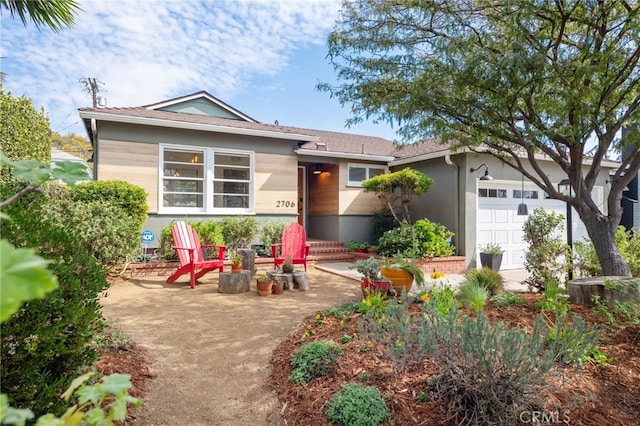 single story home with an attached garage