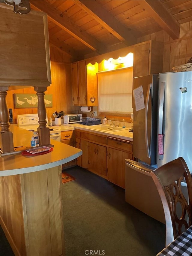 kitchen with light countertops, white appliances, wooden ceiling, and a sink