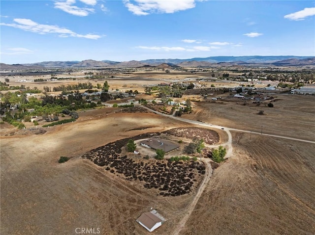 drone / aerial view featuring a mountain view