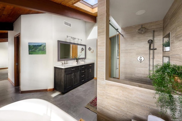 full bath with a skylight, double vanity, visible vents, beamed ceiling, and walk in shower