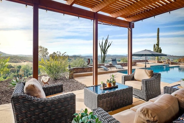 view of patio with an outdoor pool, a pergola, and an outdoor living space