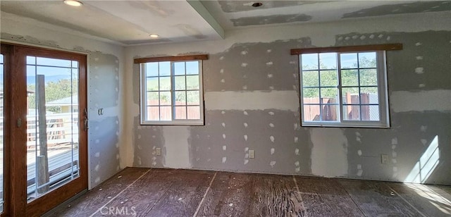 unfurnished room featuring wood finished floors