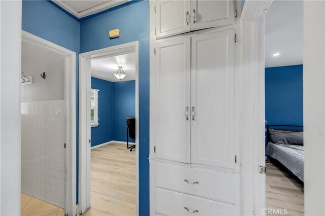 hallway featuring light wood-style floors