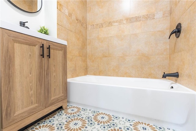 bathroom with a bathing tub and tile patterned floors