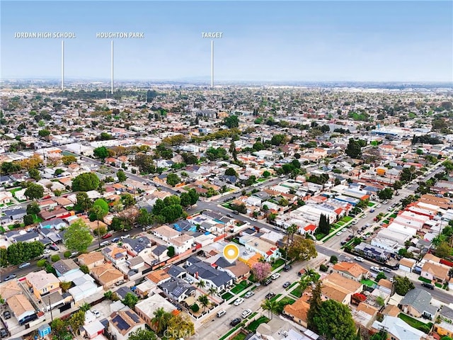 birds eye view of property with a residential view