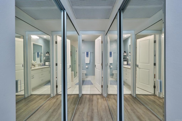 interior space featuring light wood-type flooring and visible vents