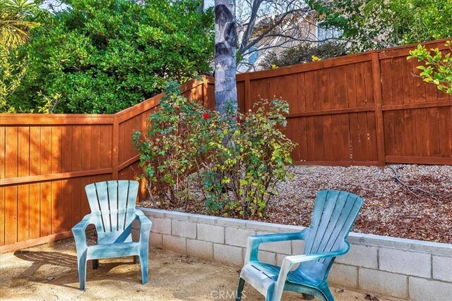 view of patio with a fenced backyard