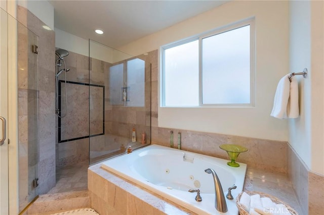 full bathroom with a whirlpool tub, a stall shower, and recessed lighting