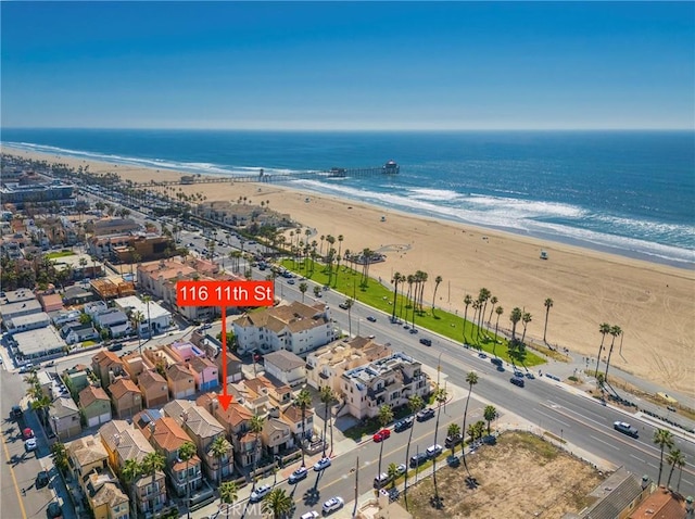 aerial view featuring a beach view and a water view