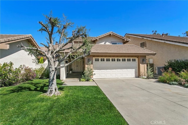 view of front of house featuring stucco siding, concrete driveway, an attached garage, a front yard, and central AC