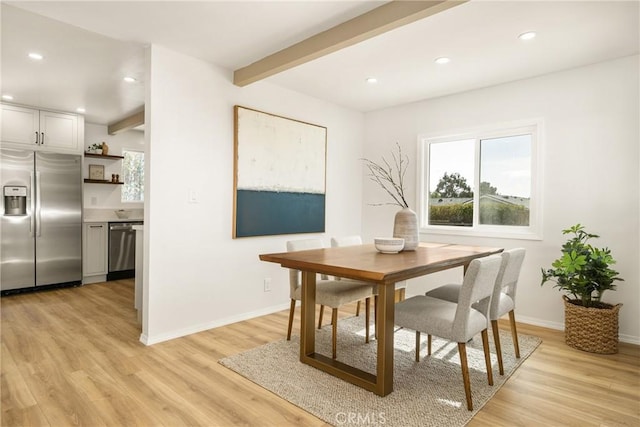 dining area with light wood-type flooring, baseboards, beamed ceiling, and recessed lighting