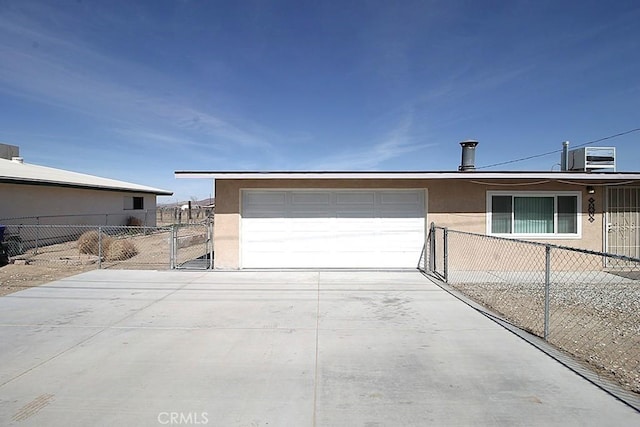 garage featuring fence