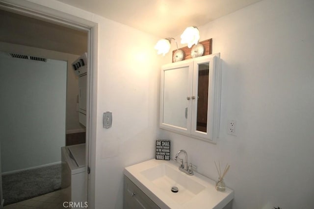 bathroom with visible vents and vanity