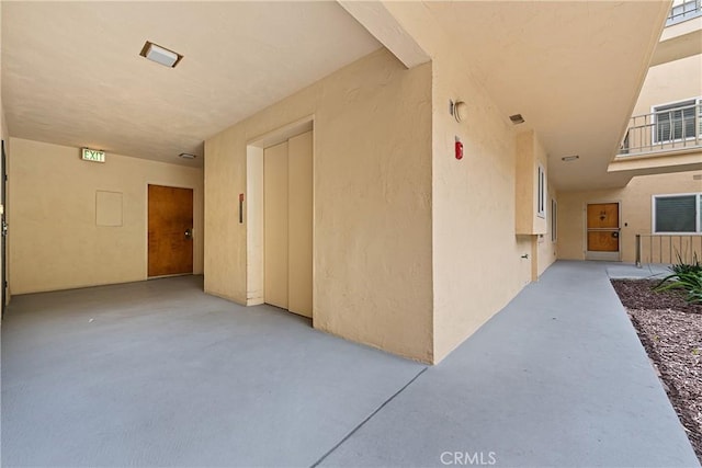 3695 Linden Ave Unit 11A, Long Beach, CA 90807 - view of exterior entry featuring a patio area