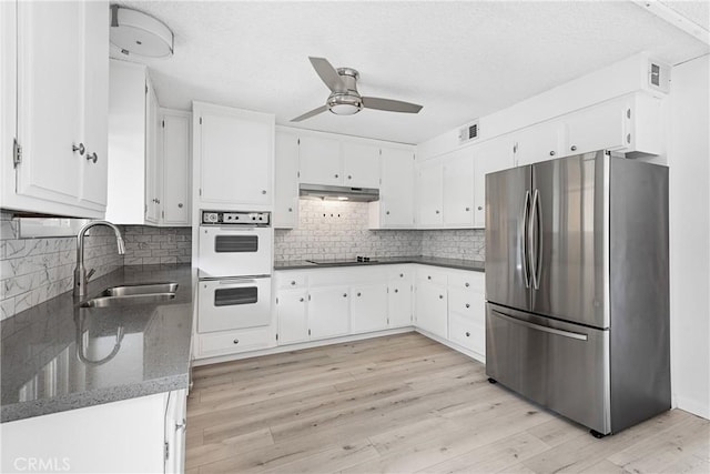 3695 Linden Ave Unit 11A, Long Beach, CA 90807 - kitchen with a sink, freestanding refrigerator, ceiling fan, under cabinet range hood, and double oven