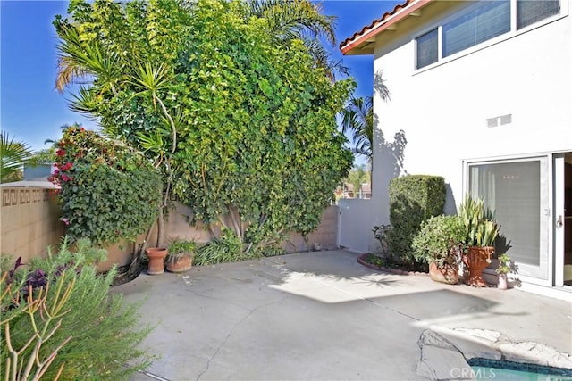 view of patio / terrace with a fenced backyard and visible vents