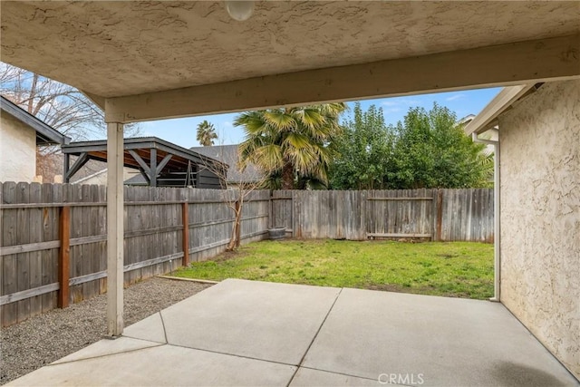 view of patio with a fenced backyard