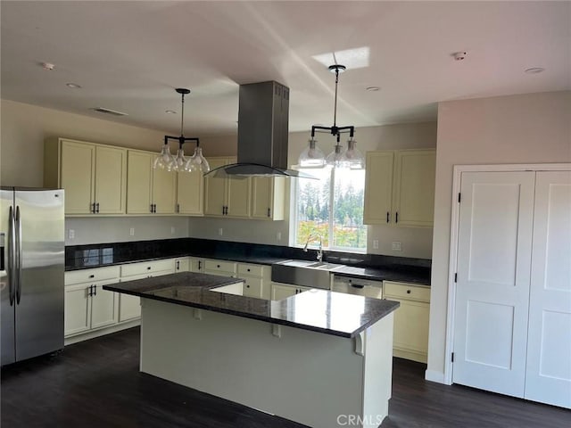 kitchen featuring a sink, stainless steel appliances, island exhaust hood, dark wood-type flooring, and a kitchen island