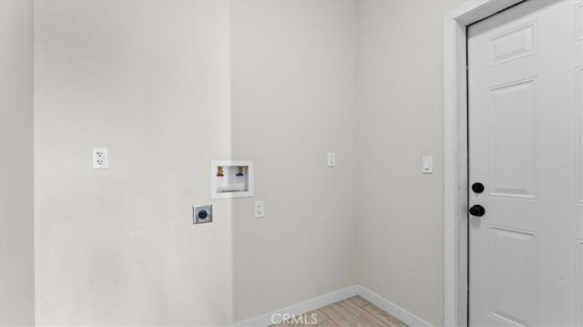 5627 Newland Rd, Paradise, CA 95969 - laundry room featuring hookup for an electric dryer, hookup for a washing machine, and baseboards