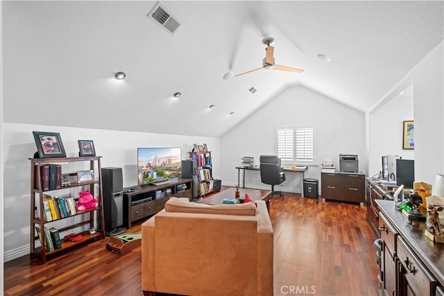 office area with baseboards, visible vents, a ceiling fan, dark wood-style flooring, and vaulted ceiling