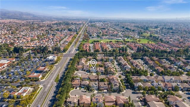 aerial view featuring a residential view and a mountain view