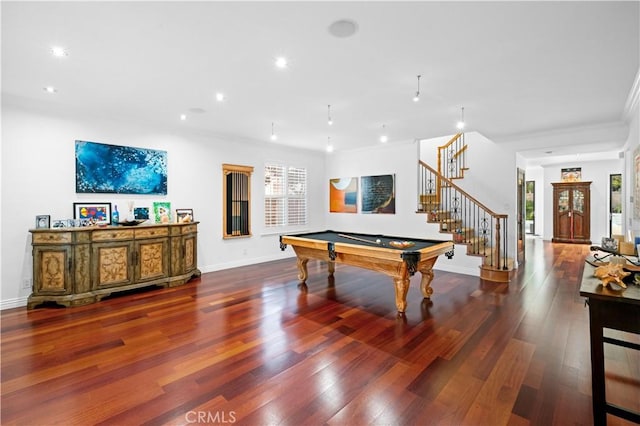 game room with plenty of natural light, wood finished floors, and baseboards