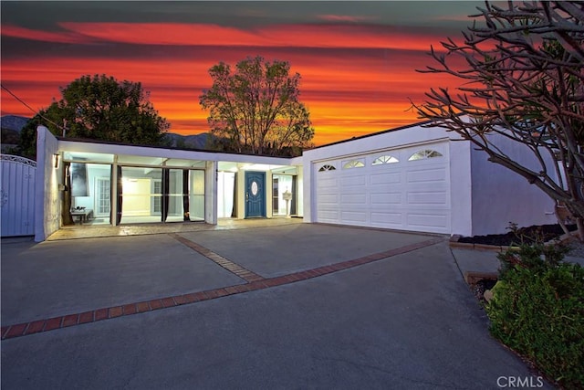 exterior space featuring concrete driveway