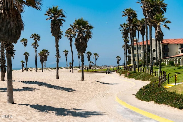 view of home's community featuring volleyball court