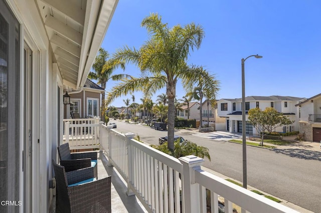 balcony featuring a residential view