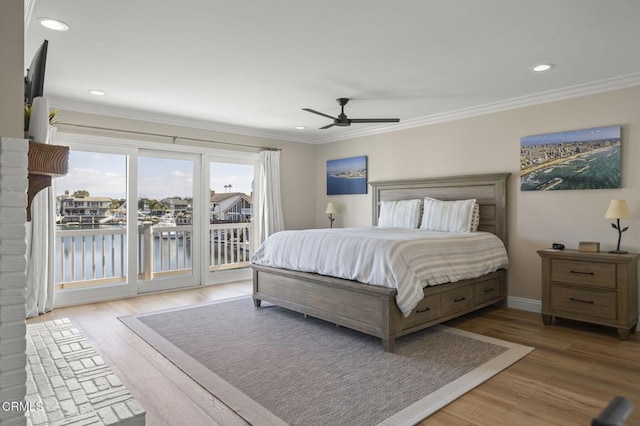 bedroom featuring ceiling fan, ornamental molding, wood finished floors, access to exterior, and recessed lighting