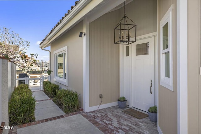 property entrance with a patio area