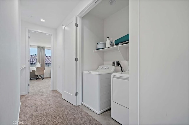 clothes washing area with light carpet, laundry area, baseboards, independent washer and dryer, and recessed lighting