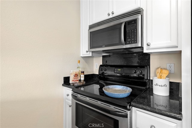 kitchen with stainless steel appliances and white cabinets