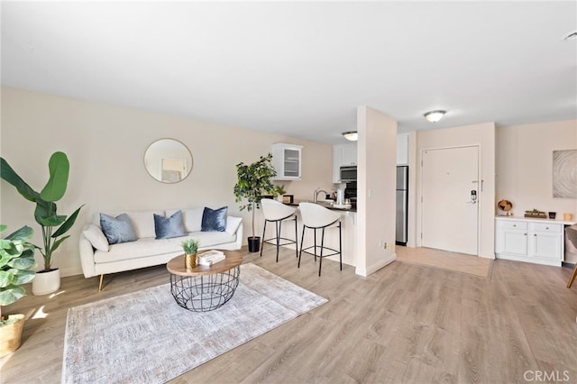 living area with light wood finished floors