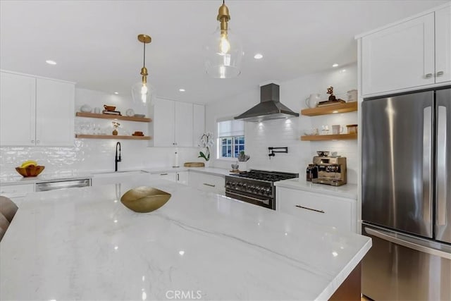 kitchen featuring decorative backsplash, appliances with stainless steel finishes, range hood, white cabinetry, and open shelves