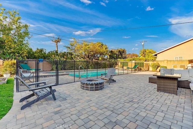 view of swimming pool with a fenced in pool, an outdoor fire pit, a patio area, and fence