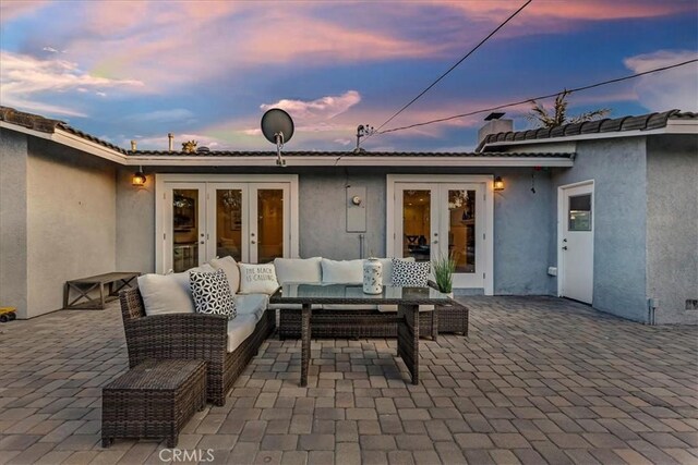 view of patio / terrace with an outdoor hangout area and french doors