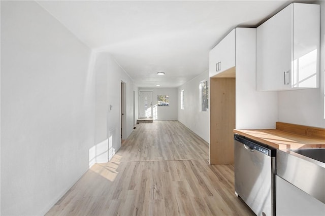 corridor with light wood-type flooring