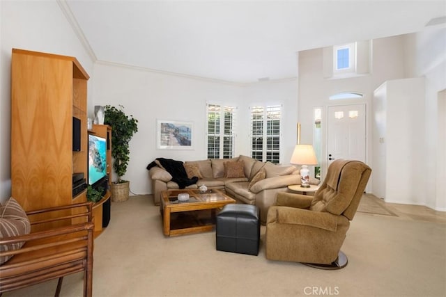 living room with carpet floors and ornamental molding