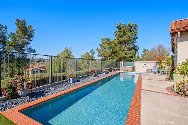 view of pool with a fenced in pool, a patio area, and a fenced backyard