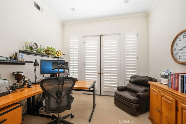 office space featuring light carpet, ornamental molding, and visible vents