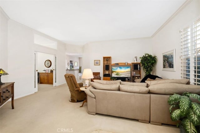 living area with light colored carpet, crown molding, and baseboards